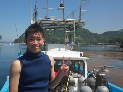 手塚さん